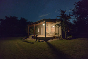 Commercial night time image of a ranch real estate property in Jacksboro, TX