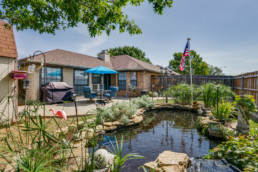 Exterior image of a koi pond at a FSBO, for sale by homeowner, real estate listing in Wichita Falls, TX