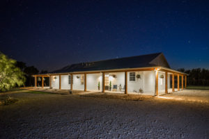 Night time image of ranch house in Graham, TX