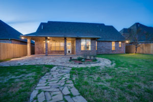 Twilight exterior image of a real estate listing in Wichita Falls, TX