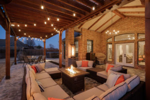 A twilight backyard image of a real estate listing in Wichita Falls, TX